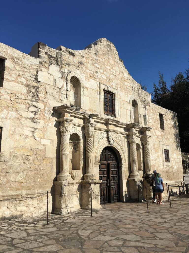 Facade of ancient Roman Catholic church on sunny day